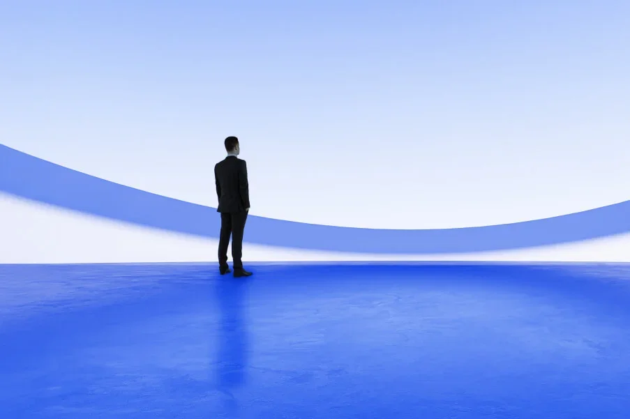 man stood in blue expanse